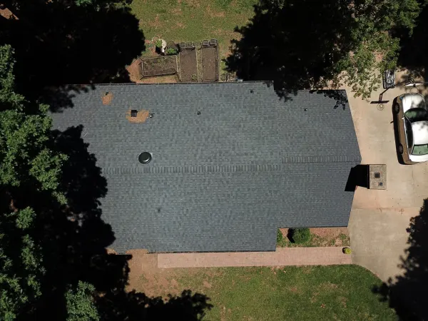 CertainTeed Landmark Moire Black shingles on a roof replacement by Baker Home Exteriors
