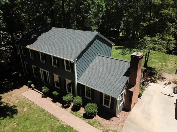 CertainTeed Landmark Moire Black shingles on a roof replacement by Baker Home Exteriors