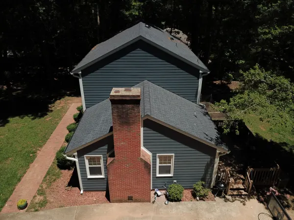 CertainTeed Landmark Moire Black shingles on a roof replacement by Baker Home Exteriors