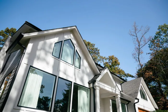 Modern Monochromatic exterior by Baker Home Exteriors
