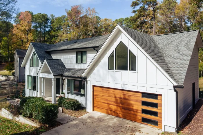 Modern Monochromatic exterior by Baker Home Exteriors