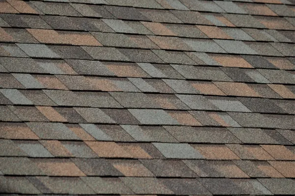 Owens Corning Duration Aged Copper shingles on a roof replacement by Baker Home Exteriors