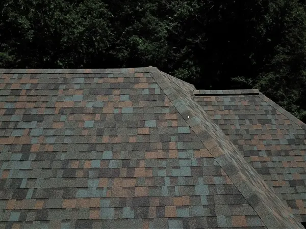 Owens Corning Duration Aged Copper shingles on a roof replacement by Baker Home Exteriors