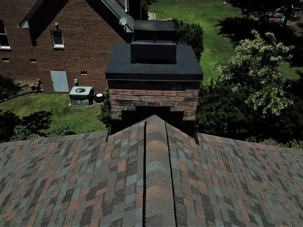 Owens Corning Duration Aged Copper shingles on a roof replacement by Baker Home Exteriors