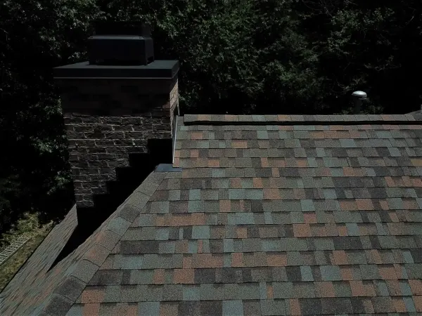 Owens Corning Duration Aged Copper shingles on a roof replacement by Baker Home Exteriors