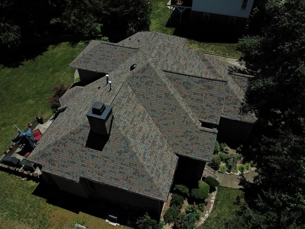 Owens Corning Duration Aged Copper shingles on a roof replacement by Baker Home Exteriors