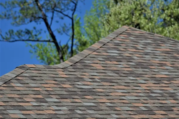 Owens Corning Duration Aged Copper shingles on a roof replacement by Baker Home Exteriors