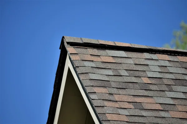 Owens Corning Duration Aged Copper shingles on a roof replacement by Baker Home Exteriors