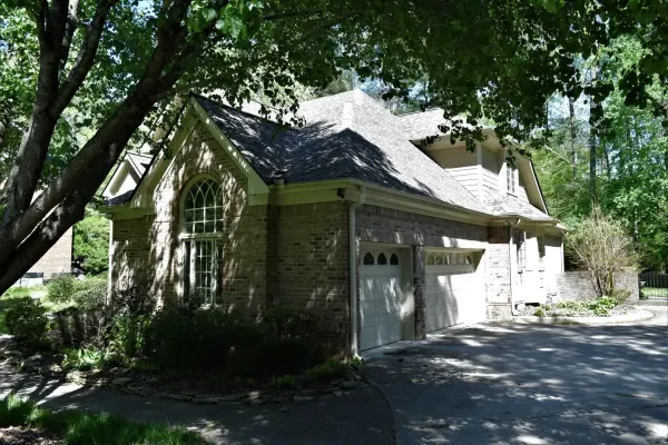 Owens Corning Duration Aged Copper shingles on a roof replacement by Baker Home Exteriors