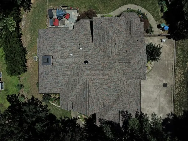 Owens Corning Duration Aged Copper shingles on a roof replacement by Baker Home Exteriors