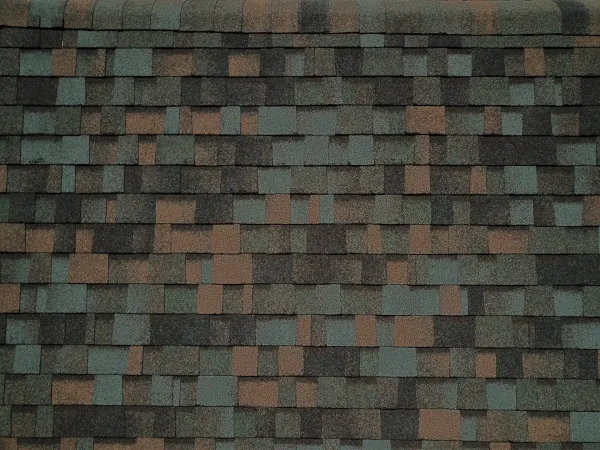 Owens Corning Duration Aged Copper shingles on a roof replacement by Baker Home Exteriors