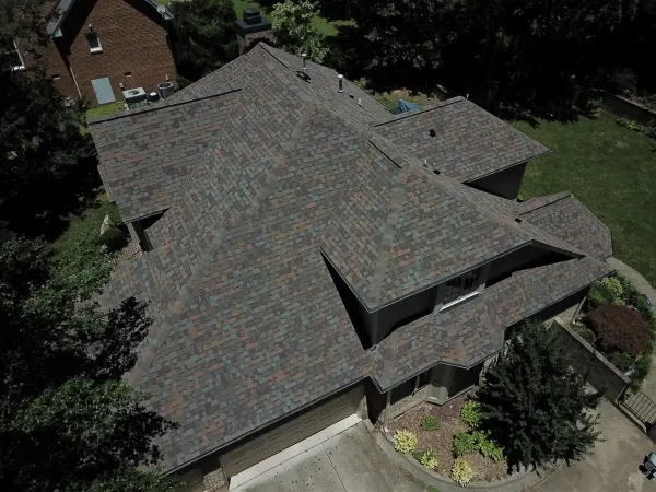 Owens Corning Duration Aged Copper shingles on a roof replacement by Baker Home Exteriors