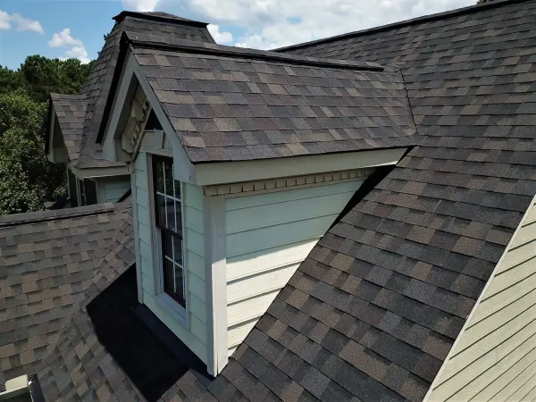 Owens Corning Duration Black Sable shingles on a roof replacement by Baker Home Exteriors