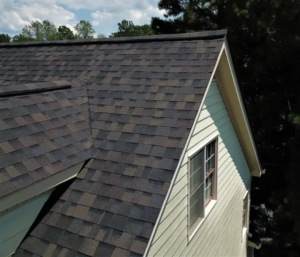 Owens Corning Duration Black Sable shingles on a roof replacement by Baker Home Exteriors