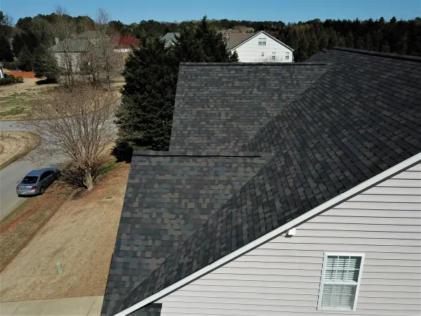 Owens Corning Duration Black Sable shingles on a roof replacement by Baker Home Exteriors
