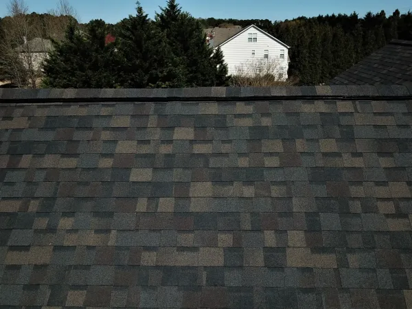 Owens Corning Duration Black Sable shingles on a roof replacement by Baker Home Exteriors