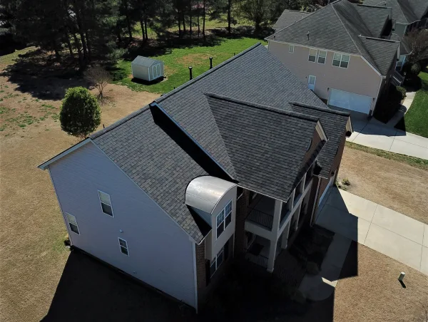 Owens Corning Duration Black Sable shingles on a roof replacement by Baker Home Exteriors