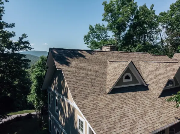Owens Corning Duration Driftwood shingles on a roof replacement by Baker Home Exteriors