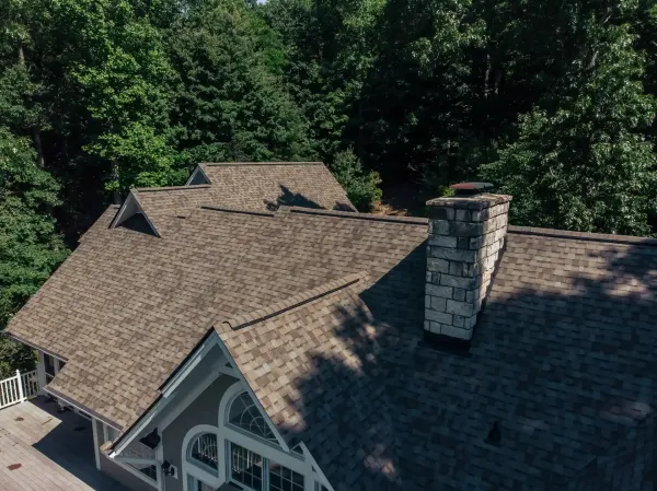 Owens Corning Duration Driftwood shingles on a roof replacement by Baker Home Exteriors