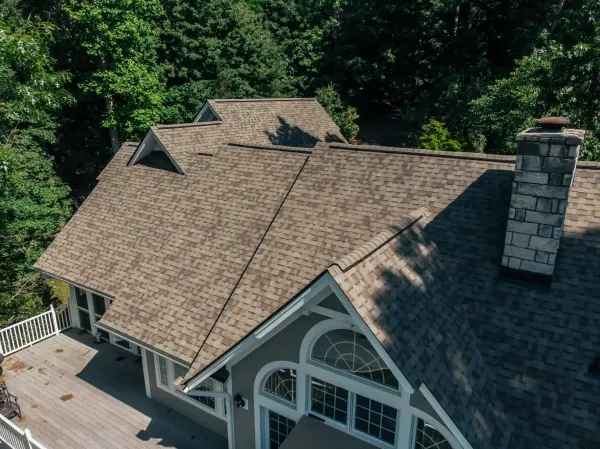 Owens Corning Duration Driftwood shingles on a roof replacement by Baker Home Exteriors