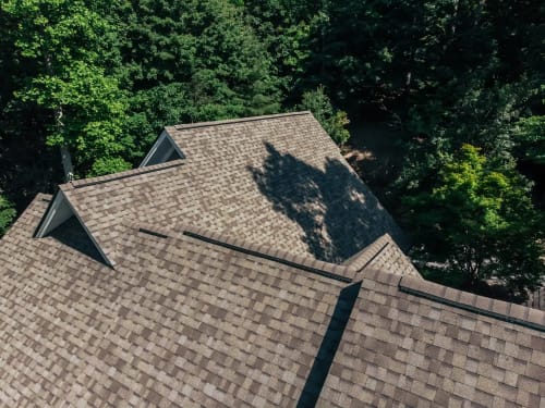 Owens Corning Duration Driftwood shingles on a completed roof replacement