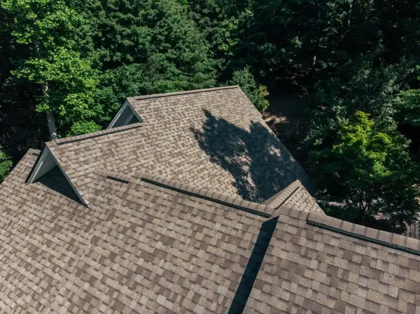 Owens Corning Duration Driftwood shingles on a roof replacement by Baker Home Exteriors