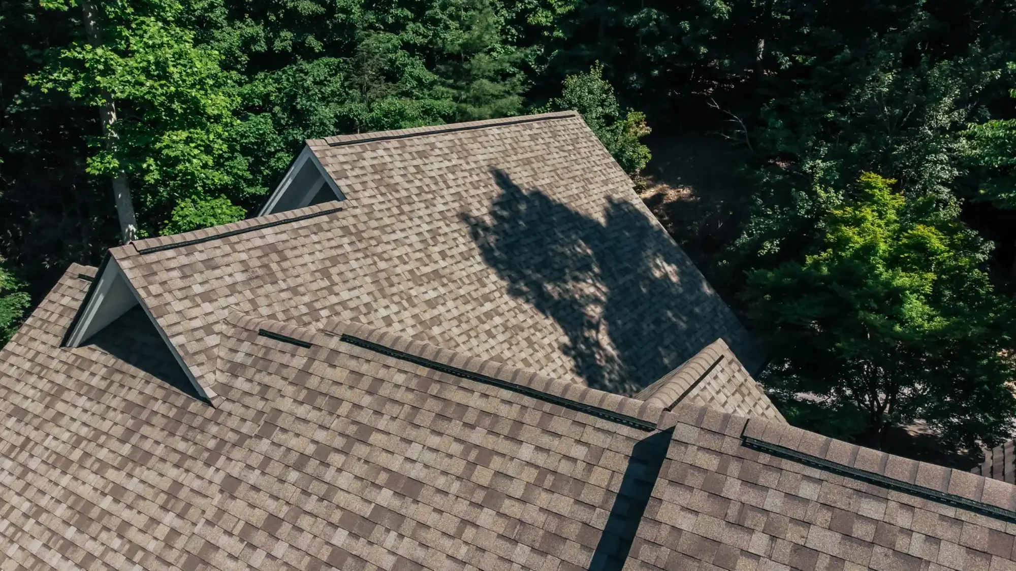 Owens Corning Duration Driftwood shingles on a roof replacement by Baker Home Exteriors