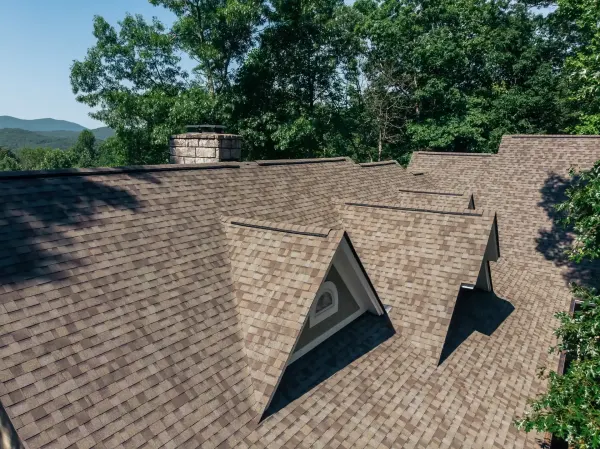 Owens Corning Duration Driftwood shingles on a roof replacement by Baker Home Exteriors