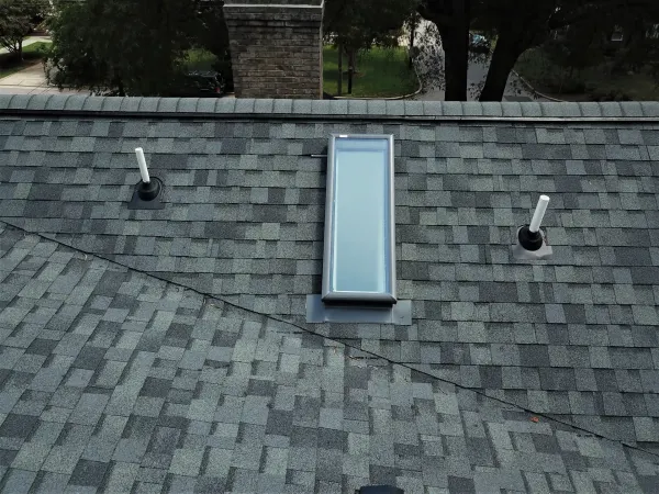 Owens Corning Duration Estate Gray shingles on a roof replacement by Baker Home Exteriors