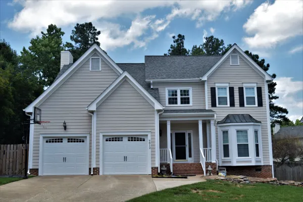 Owens Corning Duration Estate Gray shingles on a roof replacement by Baker Home Exteriors