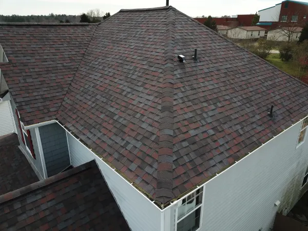 Owens Corning Duration Merlot shingles on a roof replacement by Baker Home Exteriors