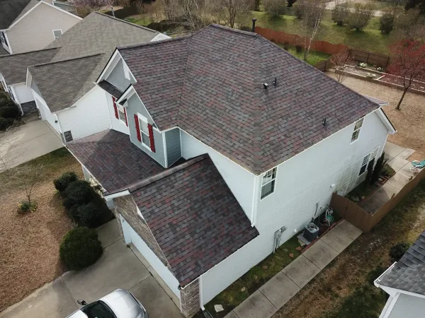 Owens Corning Duration Merlot shingles on a roof replacement by Baker Home Exteriors