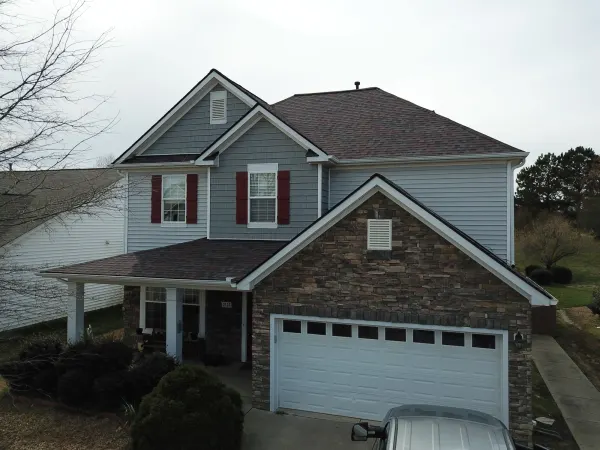 Owens Corning Duration Merlot shingles on a roof replacement by Baker Home Exteriors
