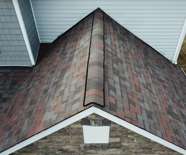 Owens Corning Duration Merlot shingles on a roof replacement by Baker Home Exteriors