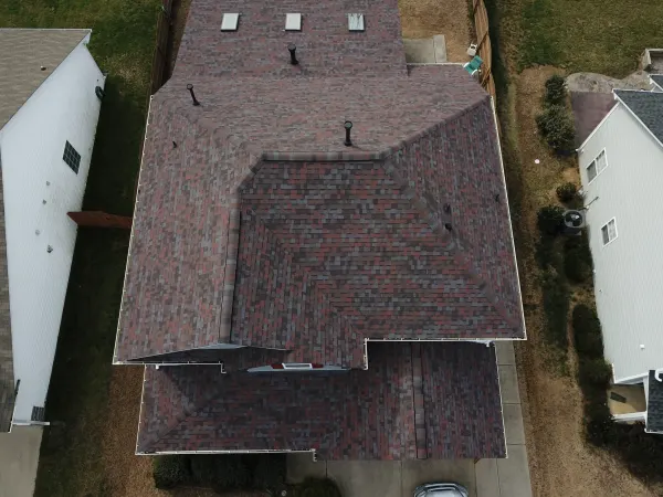 Owens Corning Duration Merlot shingles on a roof replacement by Baker Home Exteriors