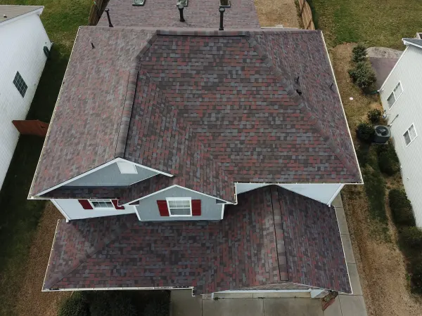 Owens Corning Duration Merlot shingles on a roof replacement by Baker Home Exteriors