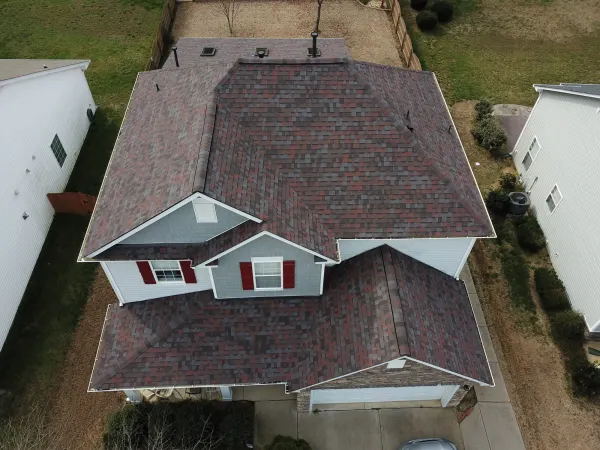 Owens Corning Duration Merlot shingles on a roof replacement by Baker Home Exteriors