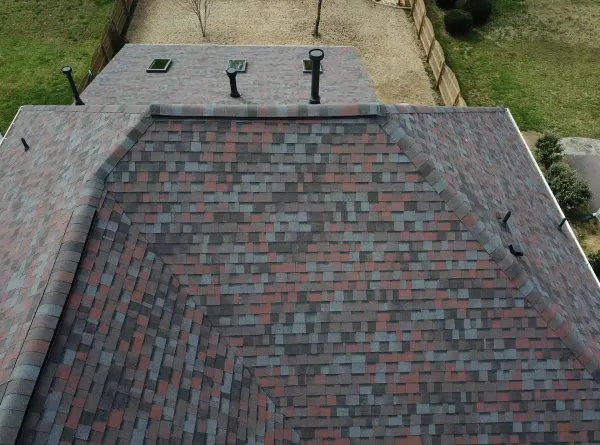 Owens Corning Duration Merlot shingles on a roof replacement by Baker Home Exteriors