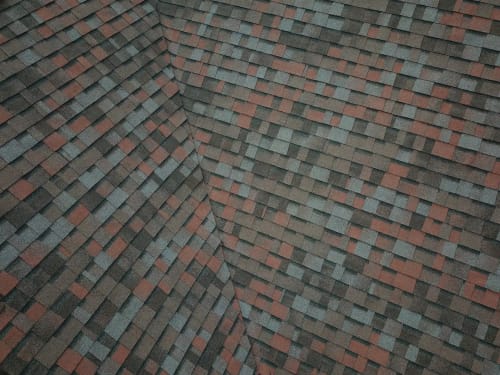 Owens Corning Duration Merlot shingles on a completed roof replacement