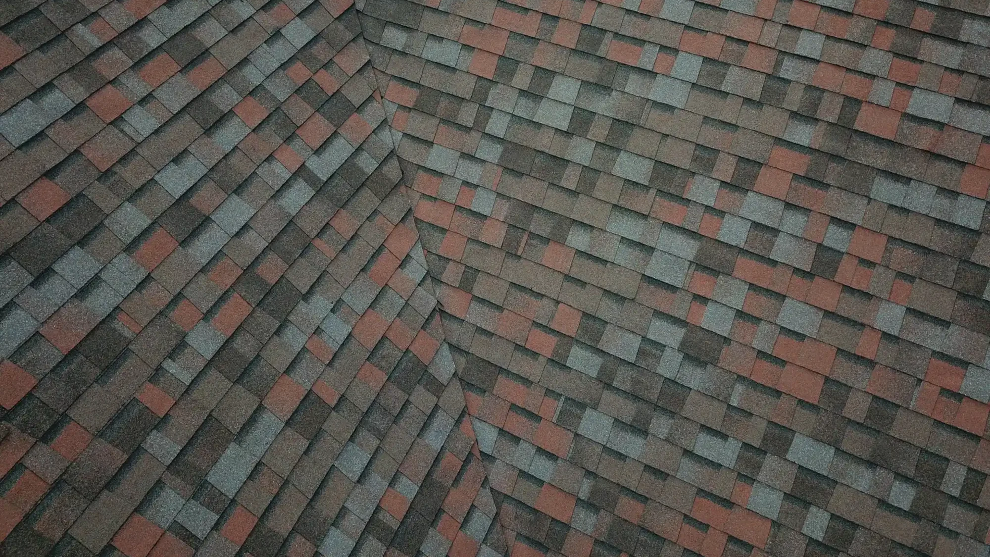 Owens Corning Duration Merlot shingles on a roof replacement by Baker Home Exteriors