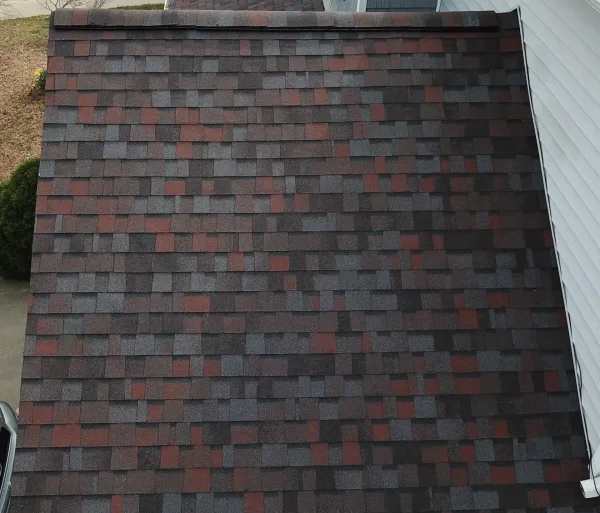 Owens Corning Duration Merlot shingles on a roof replacement by Baker Home Exteriors