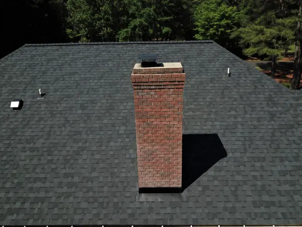 Owens Corning Duration Onyx Black shingles on a roof replacement by Baker Home Exteriors