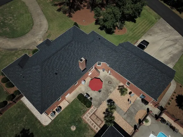 Owens Corning Duration Onyx Black shingles on a roof replacement by Baker Home Exteriors