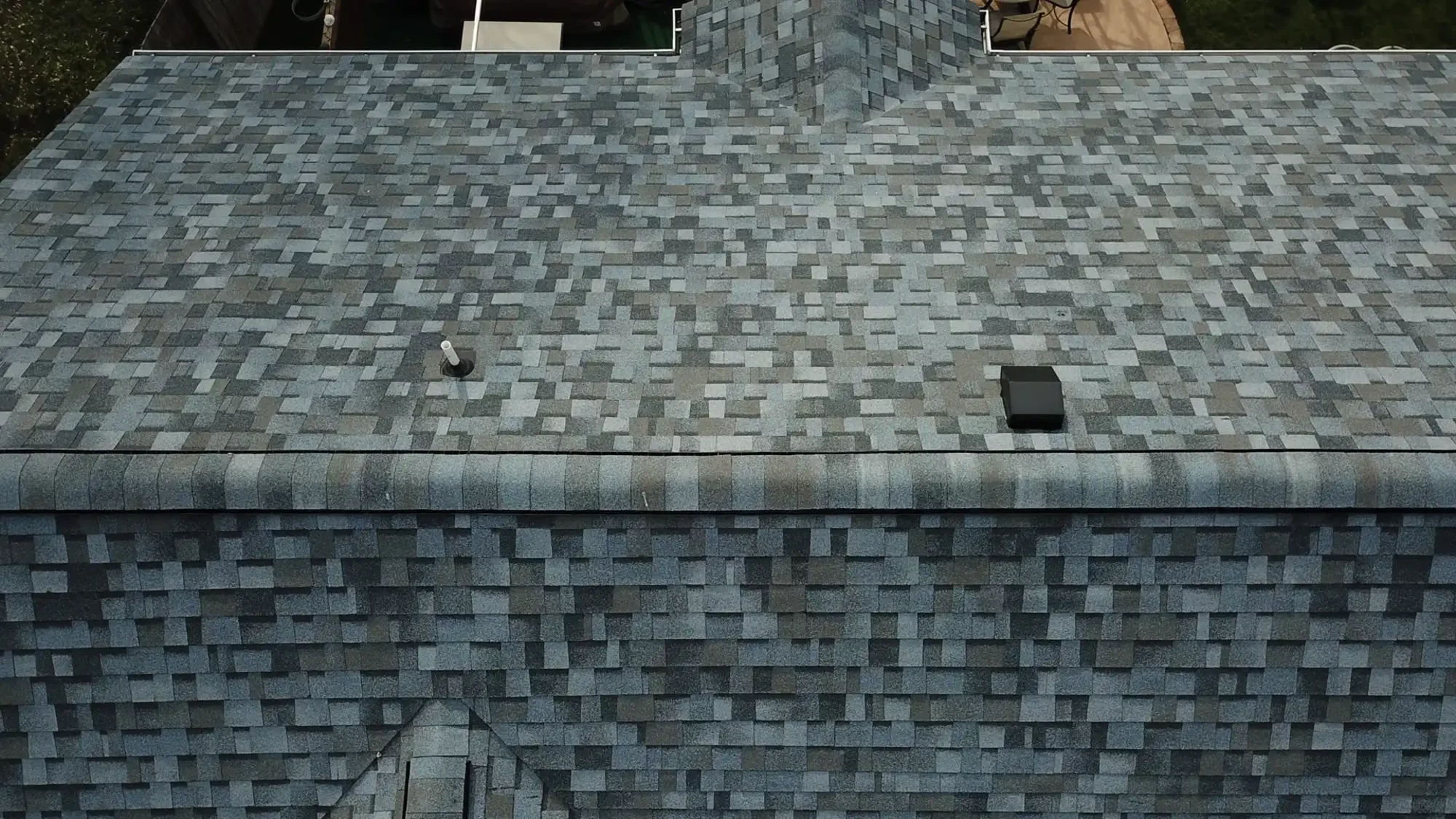 Owens Corning Duration Pacific Wave shingles on a roof replacement by Baker Home Exteriors