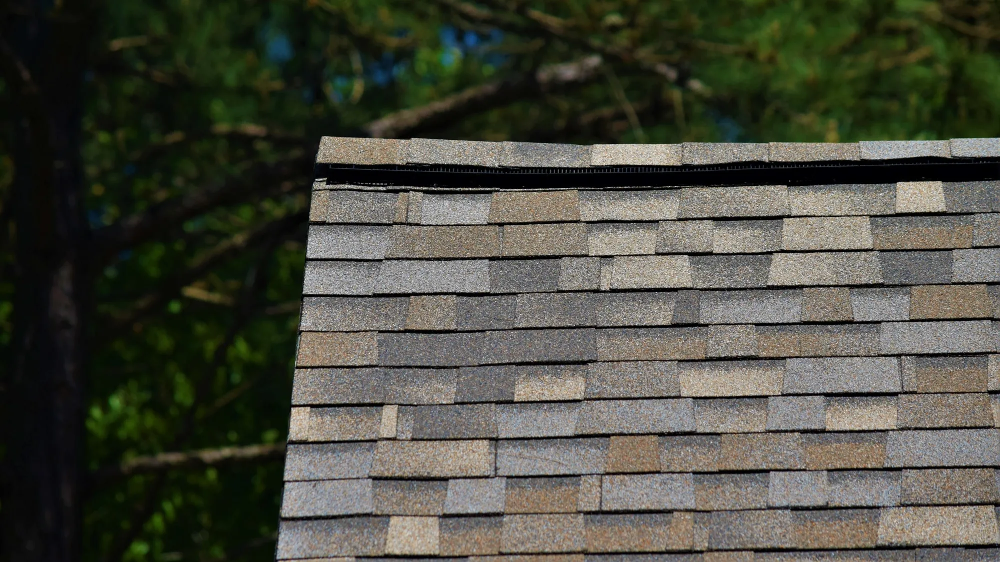 Owens Corning Duration Sand Dune shingles on a roof replacement by Baker Home Exteriors