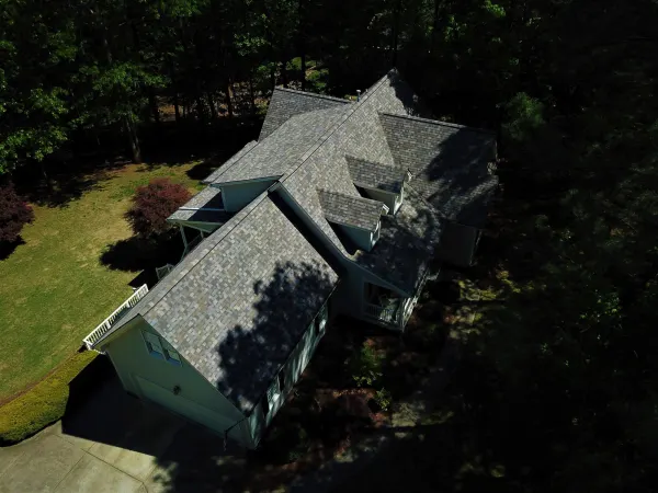 Owens Corning Duration Sand Dune shingles on a roof replacement by Baker Home Exteriors