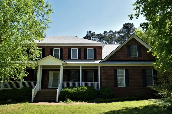 Owens Corning Duration Shasta White shingles on a roof replacement by Baker Home Exteriors
