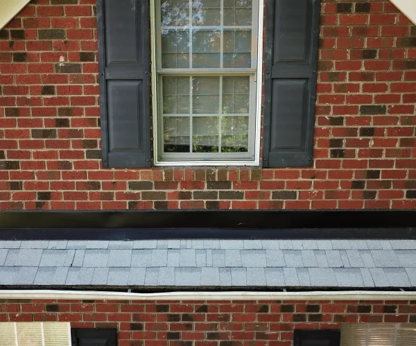 Owens Corning Duration Shasta White shingles on a roof replacement by Baker Home Exteriors