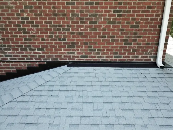 Owens Corning Duration Shasta White shingles on a roof replacement by Baker Home Exteriors