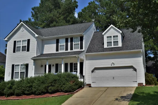 Owens Corning Duration Williamsburg Gray shingles on a roof replacement by Baker Home Exteriors